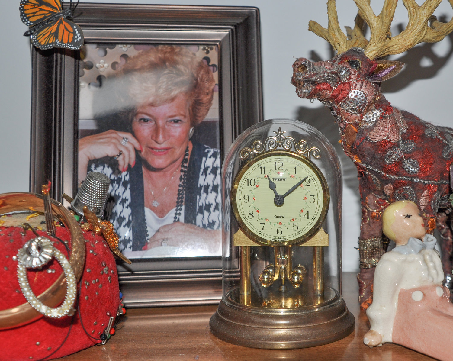 I inherited Mom's "anniversary clock" (yes, that's Barbara Fox just behind it)  which keeps time with a mechanism called a torsion pendulum and sits on my dresser in the bedroom. She loved this little clock and now I do too. Thanks, Mom.